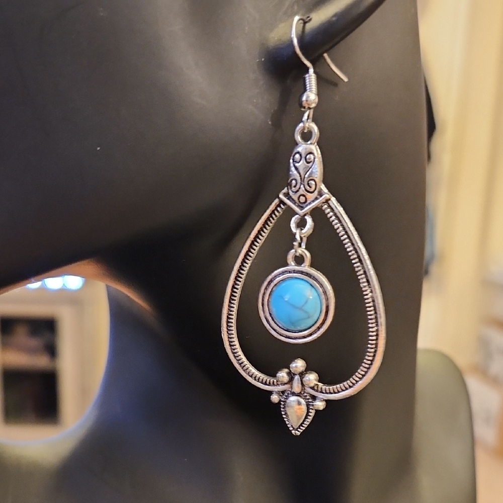 Silver and Blue Teardrop Earrings Ornate Design